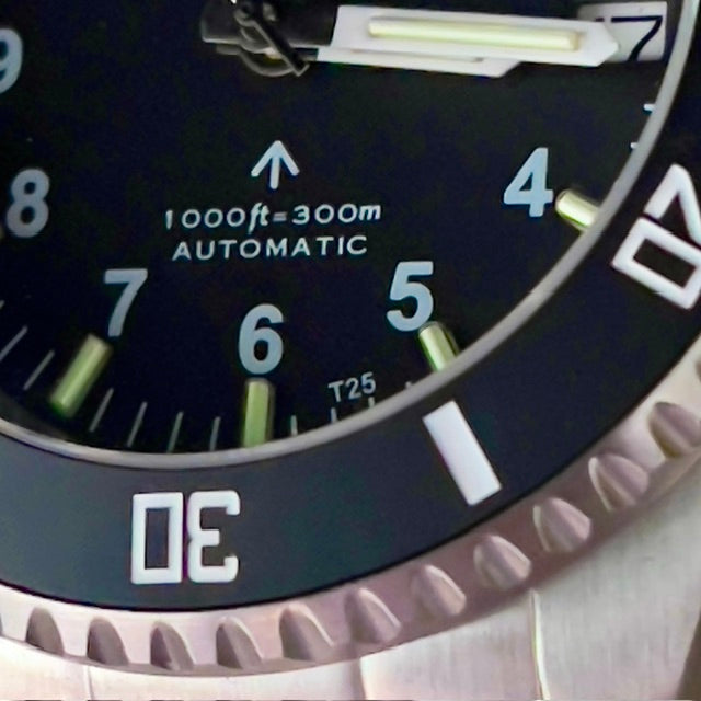MWC 24 Jewel 300m Automatic Military Divers Watch with Tritium GTLS Illumination, Sapphire Crystal and Ceramic Bezel and Steel Bracelet